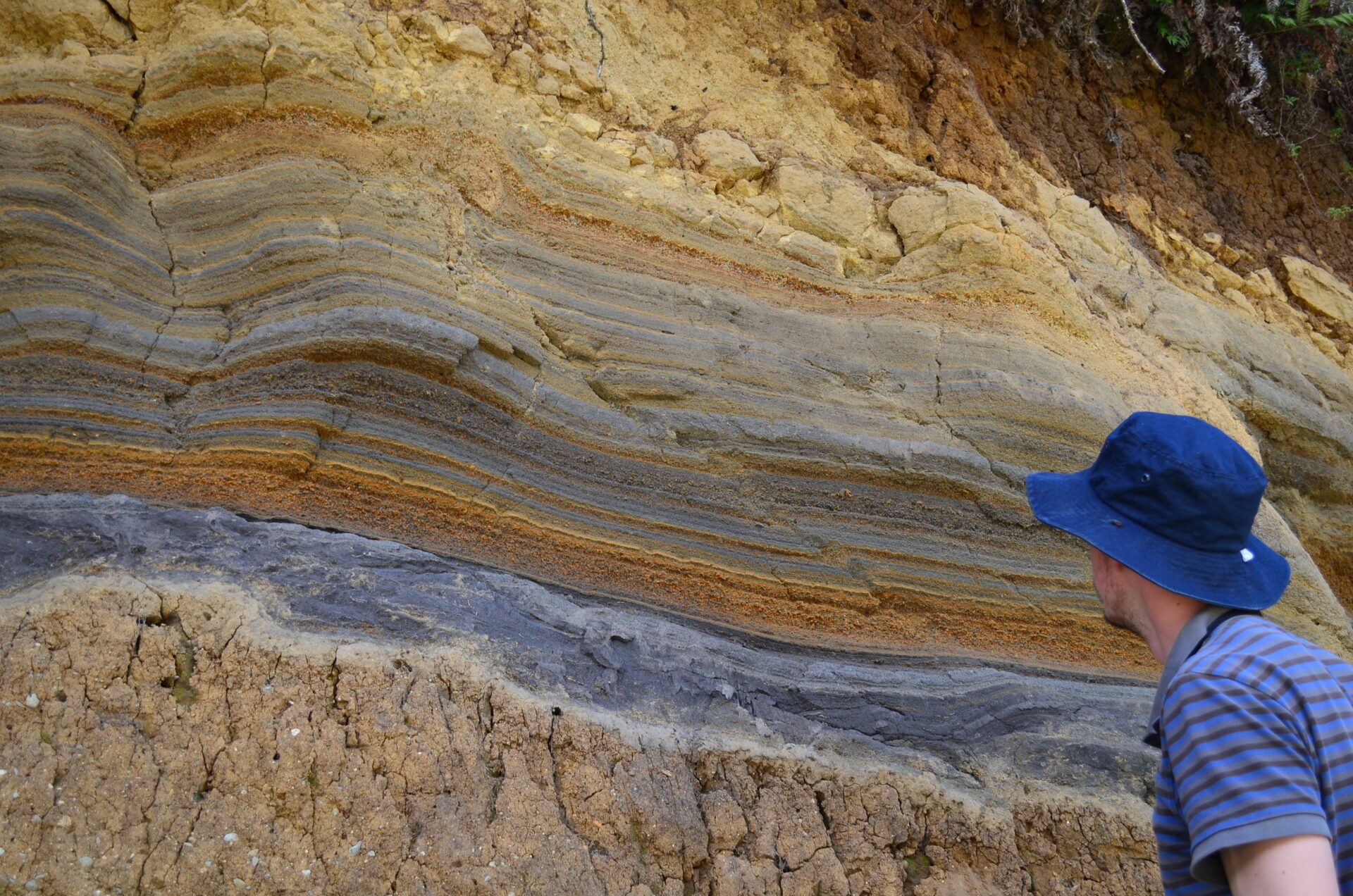 Geologist looking at tephra deposit