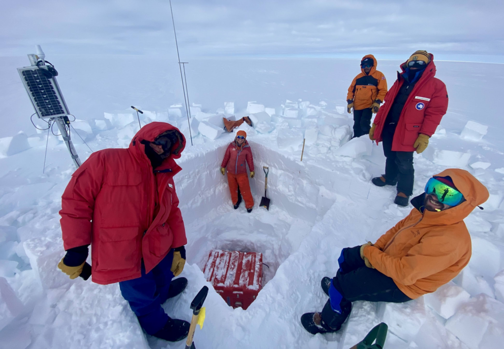 A team of scientists undertake geophysical operations on Antarctica's Thwaites Glacier.